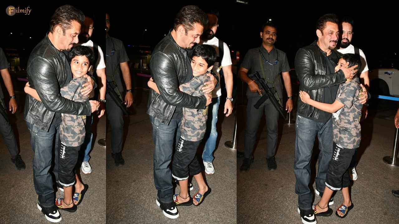 Salman Khan Wins Hearts - Hugs A Young Fan At Airport