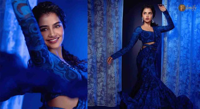 The Elegance of Georgette: Anupama's Blue & Black Printed Saree