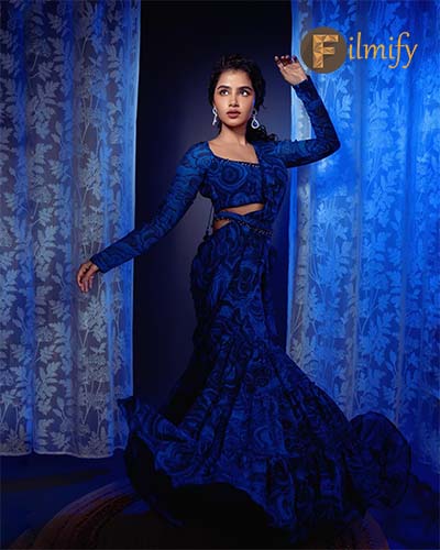 The Elegance of Georgette: Anupama's Blue & Black Printed Saree